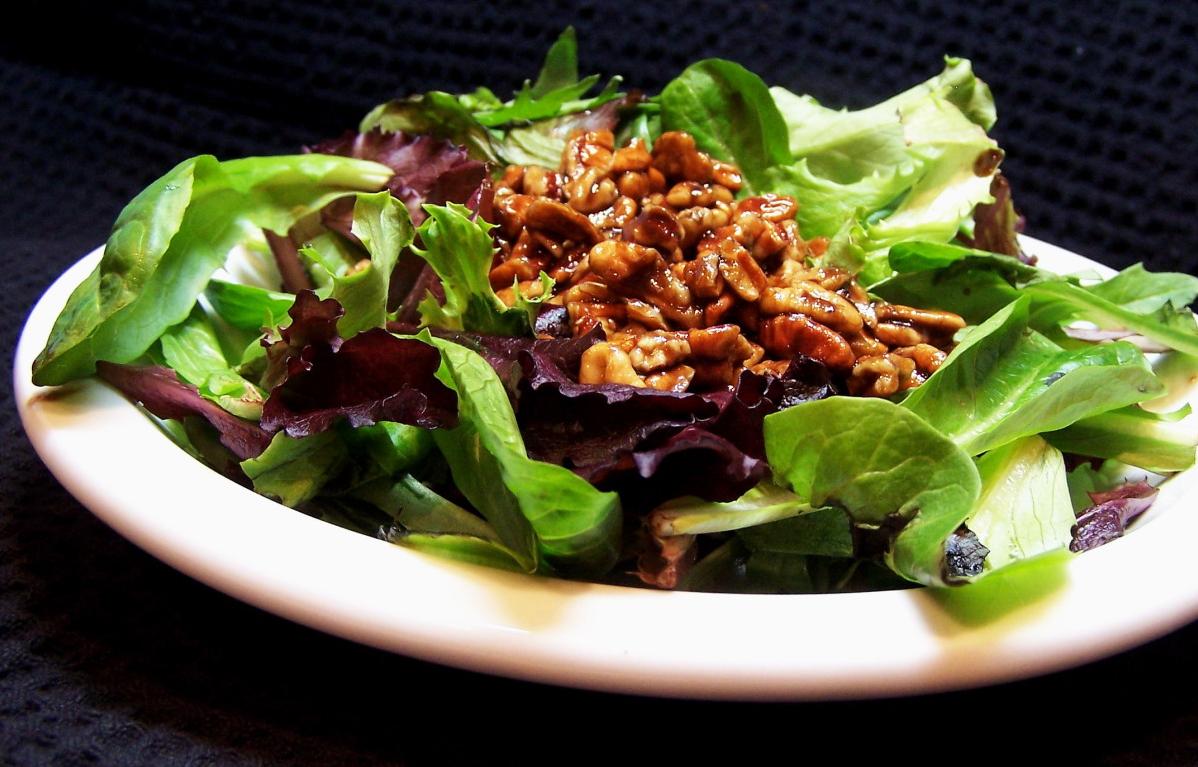  A mouth-watering bowl of Southern Greens with Warm Pecan Dressing
