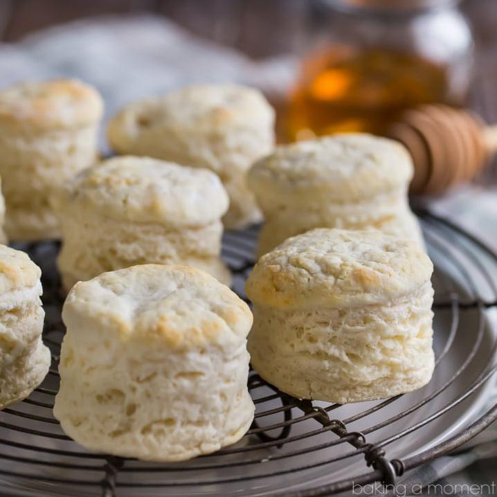 A mouth-watering serving of biscuits topped with a drizzle of honey