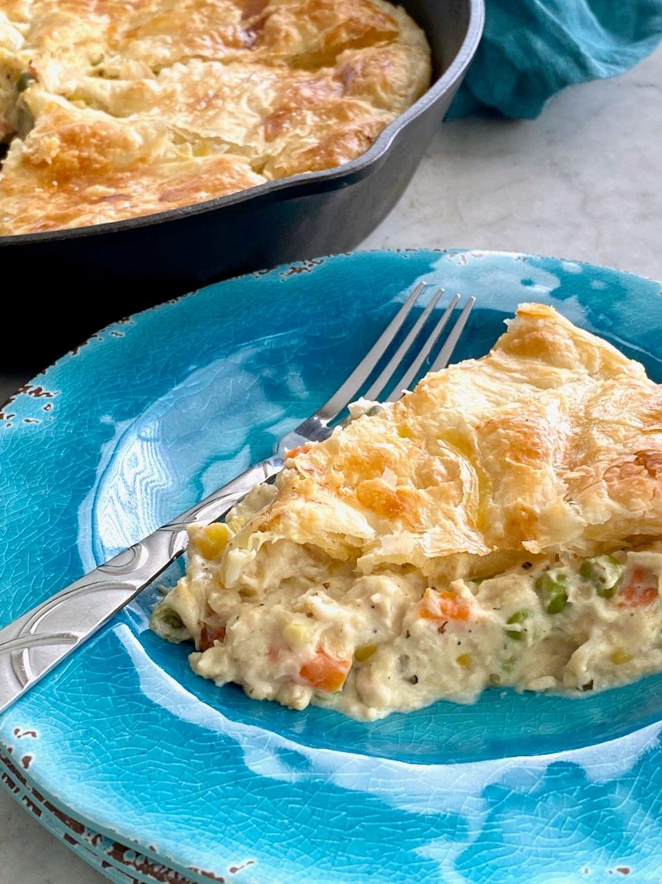  Filled with tender chicken, veggies, and spices, this pie will warm your soul.