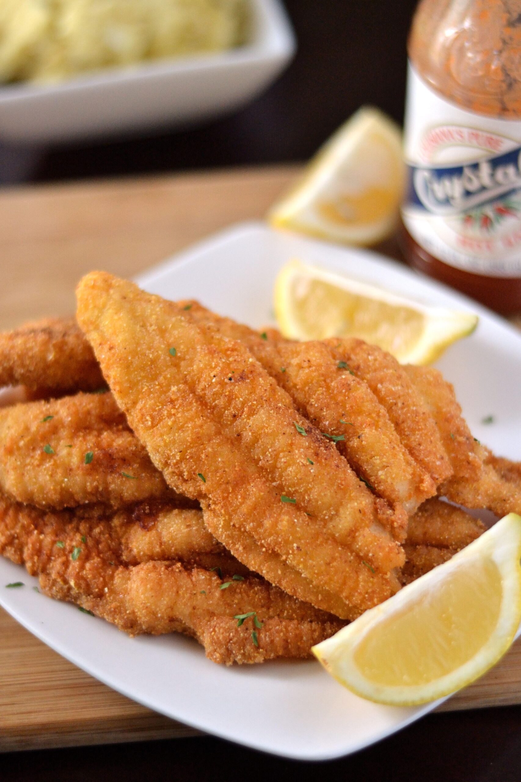  Flour, cornmeal, and spices come together to create the perfect breading for our catfish.