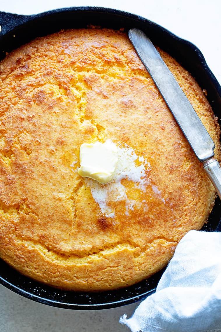  Get ready to dive into a southern classic - warm, buttery cornbread fresh from the oven.