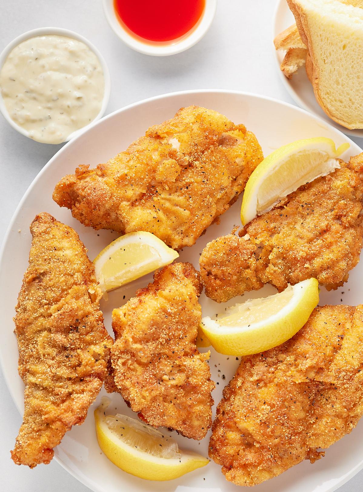  Golden brown and crispy fried catfish, Southern-style.