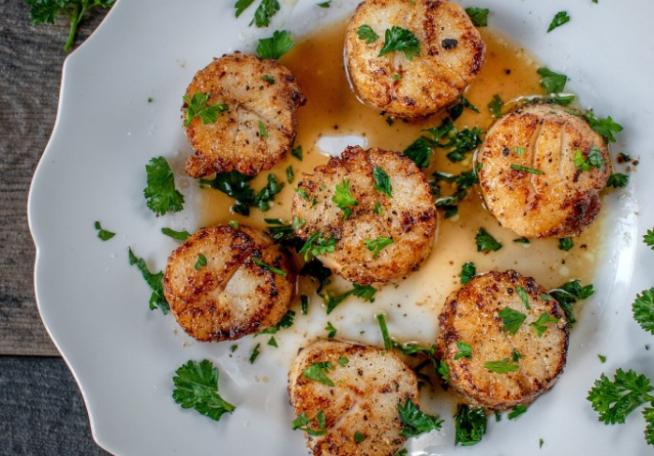  Sweet Tea Chili Sauce: This sauce adds a sweet and spicy kick to succulent scallops.