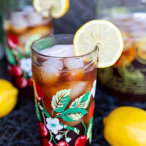  The best sweet tea is made with love, some fresh mint, and bright lemon wedges.