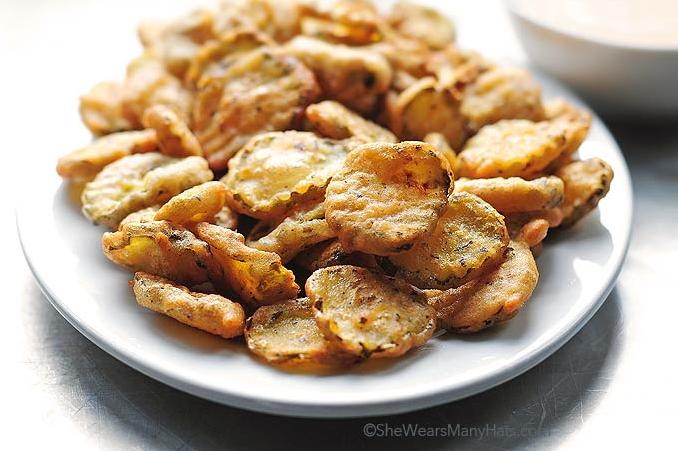  The perfect balance of tangy and savory, these fried pickles are a flavor explosion.