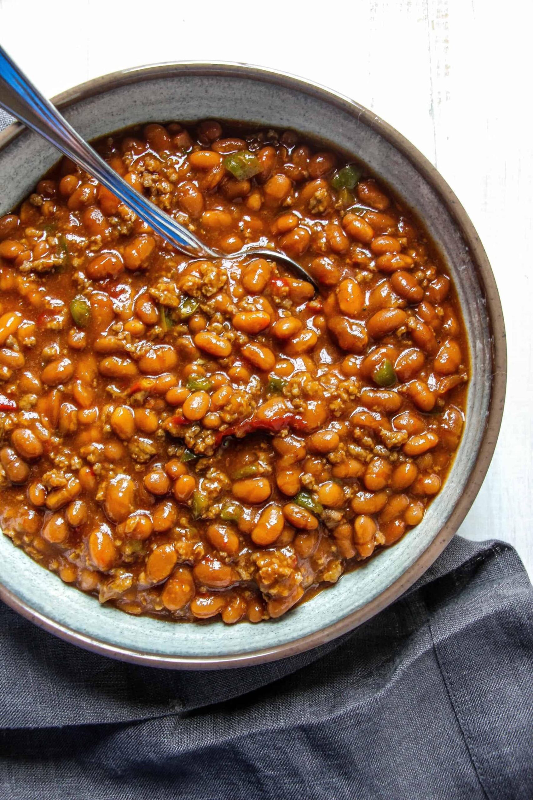  These beans are slow-cooked to perfection, allowing the flavors to meld together harmoniously.