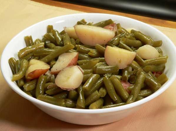 These green beans and potatoes are simmered in a savory broth until perfection.