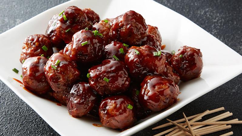 These meatballs are smothered in a sweet and tangy barbecue sauce, just waiting to be devoured!